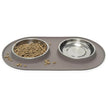 The raised edges of the silicone base, designed to contain spills and prevent crumbs from spreading during feeding time.