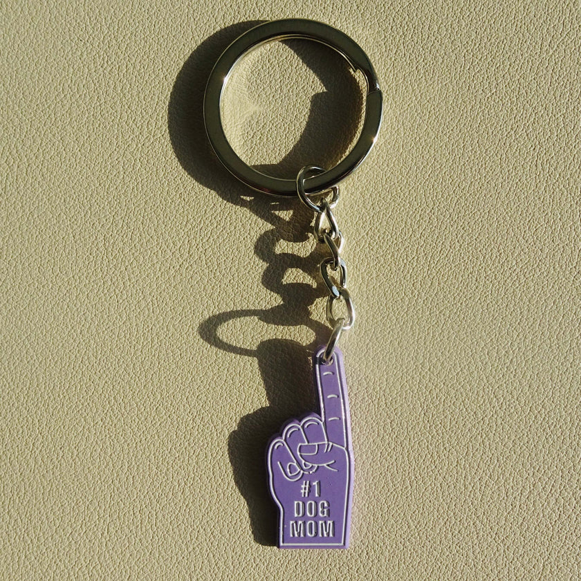 Adorable enamel #1 Dog Mom Pin featuring a proud pet parent design, handcrafted by local artisan @torontodogmoms, showcasing love for dogs and city pride.