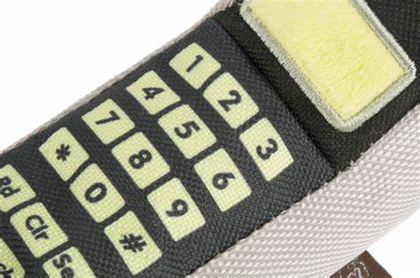 90s Are Calling Dog Toy featuring a retro block cellphone design with a tube squeaker and crinkle fabric, perfect for nostalgic playtime fun.